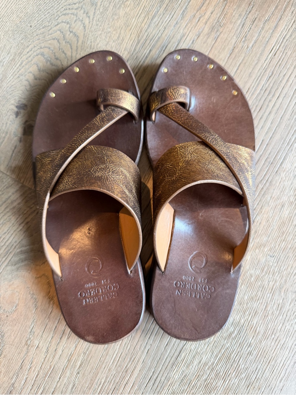 Calleen Cordero Bronze Brown Leather Cross-Strap Sandals with Gold Studs
